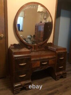 Antique chest of drawers, dresser with mirror, and bed with head and footboard