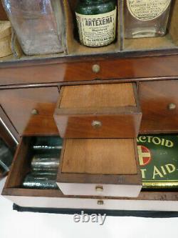 Antique medical chest medicine cabinet bottles scales potion apothecary mahogany