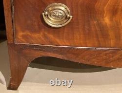Diminutive Mahogany Bow Front Chest with French Feet, circa 1790