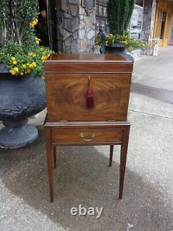 Grand Mahogany Cellarette crafted by Henkel Harris 20thc